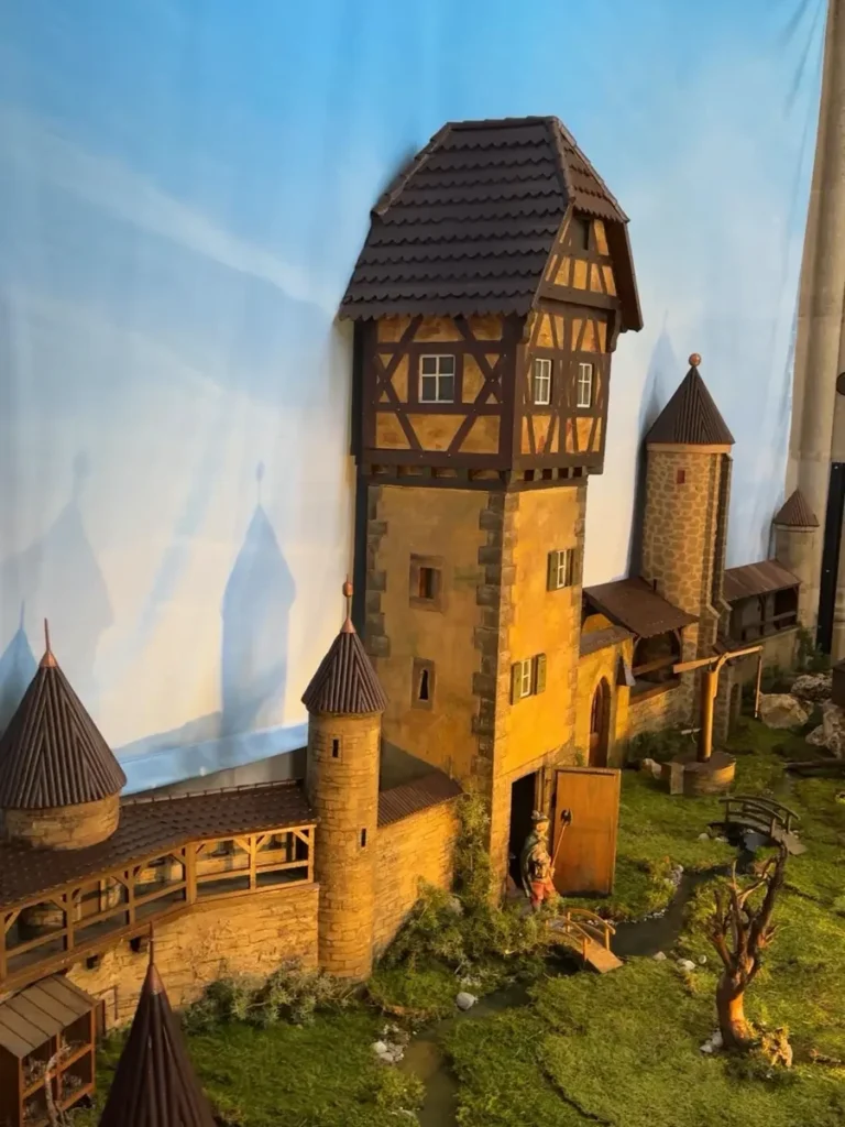Nativity scene with medieval town halls and buildings 
