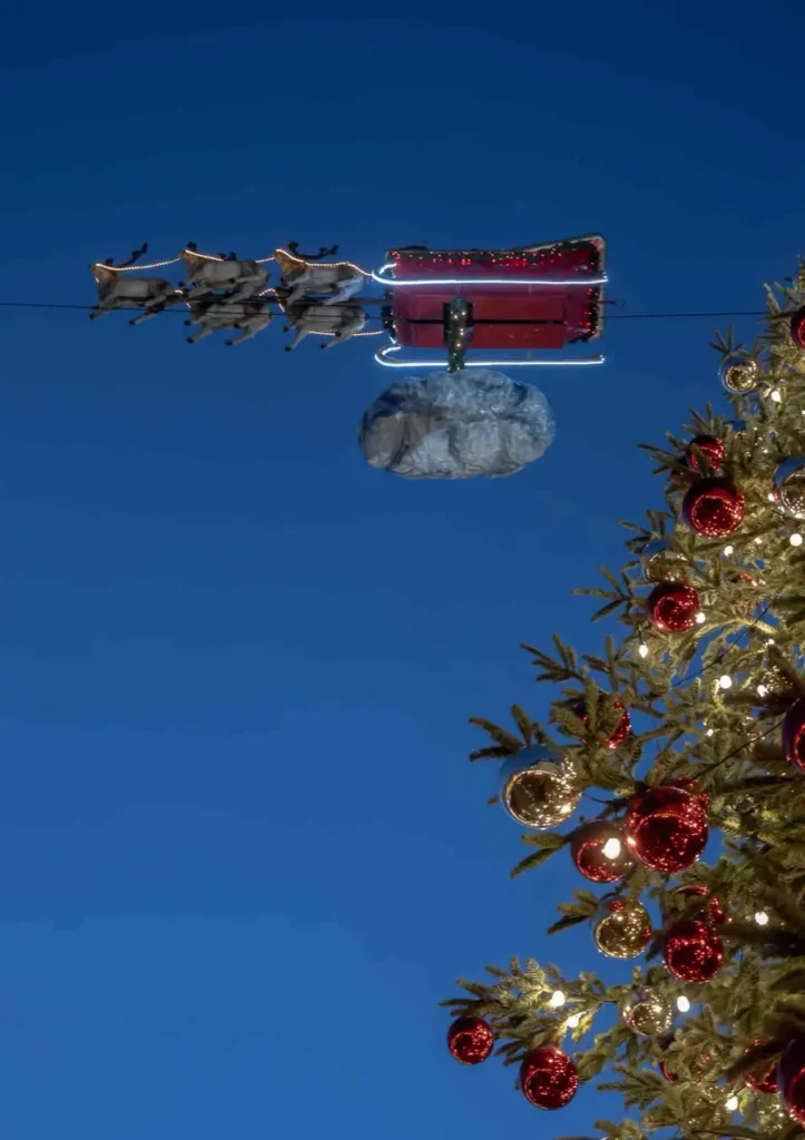 Flying Santa Claus sleigh with reindeers at the underrated Christmas market of Saarbrücken