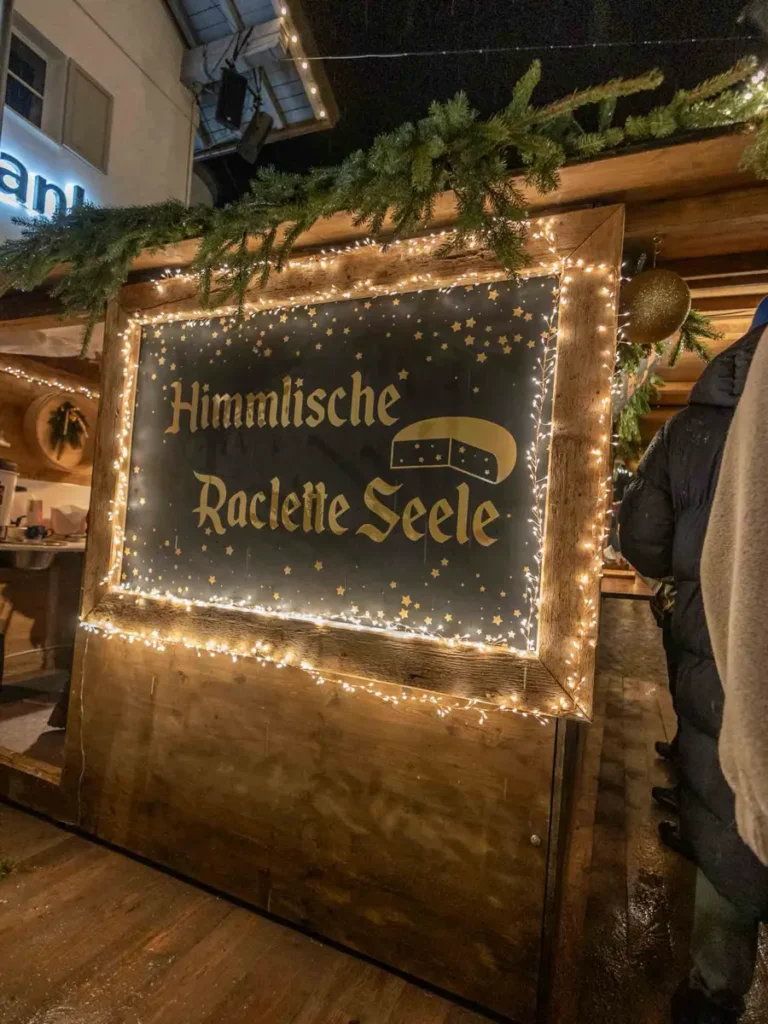 Illuminated sign at a a Christmas market stall in Bad Hindelang, Germany