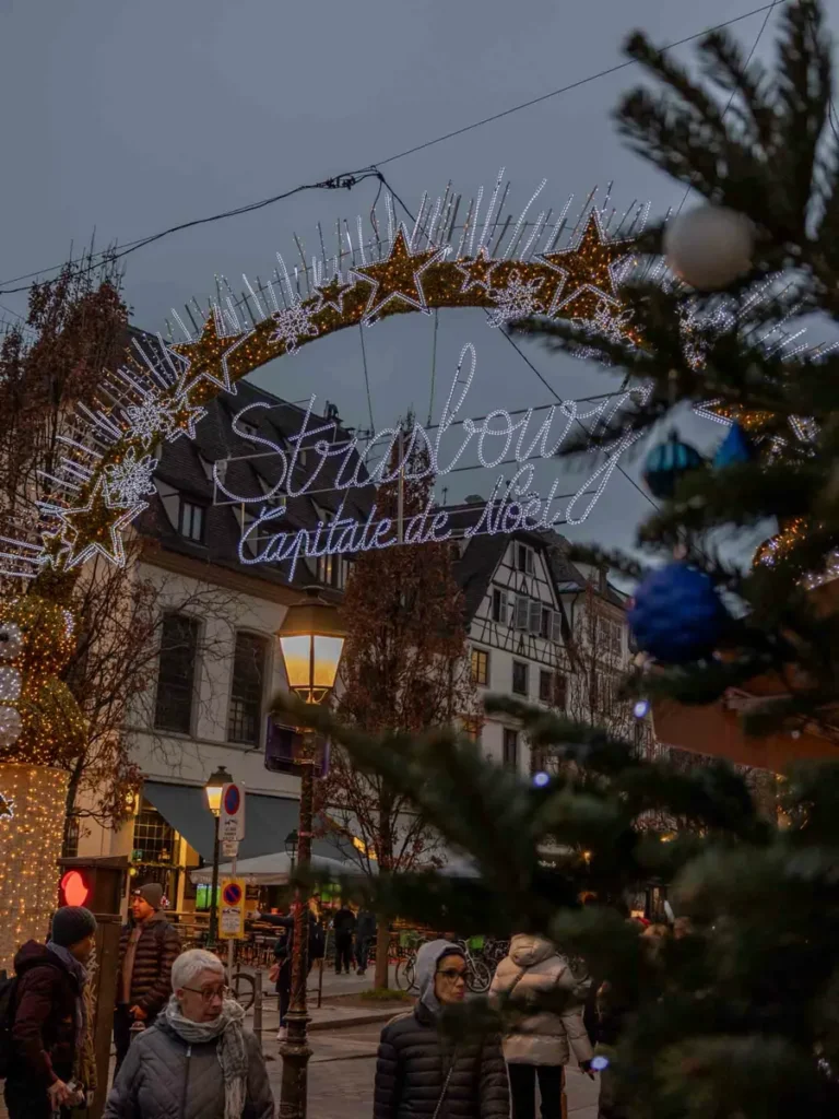 Illuminates Christmas lights and decorations above the road in the Captial of Christmas - Strasbourg, Alsace